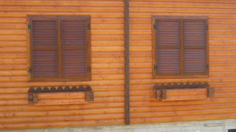 Casa din lemn lamelar semirotund